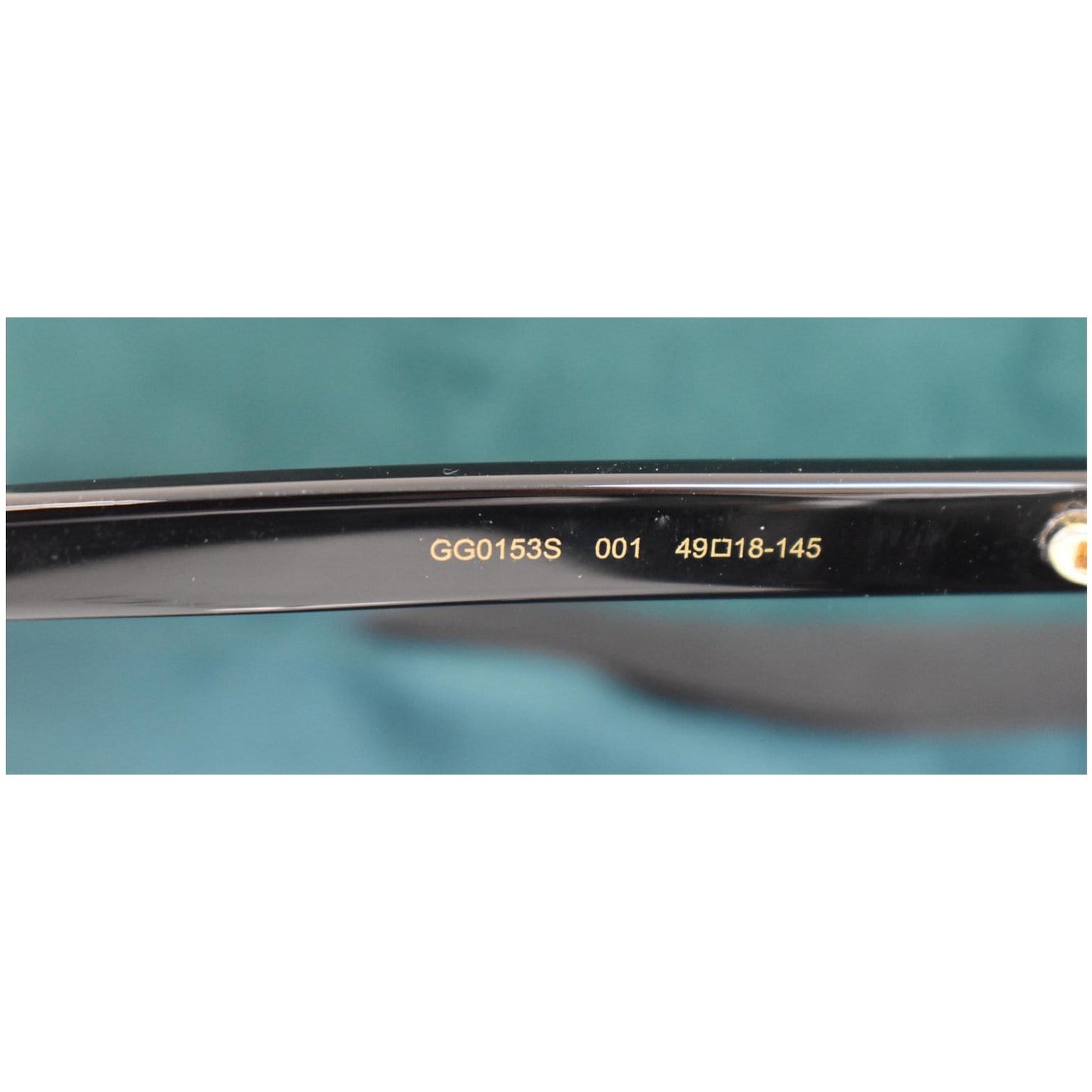 GUCCI GG0153S 001 Black Frame Cat Eye Sunglasses Pink Mirrored Lens