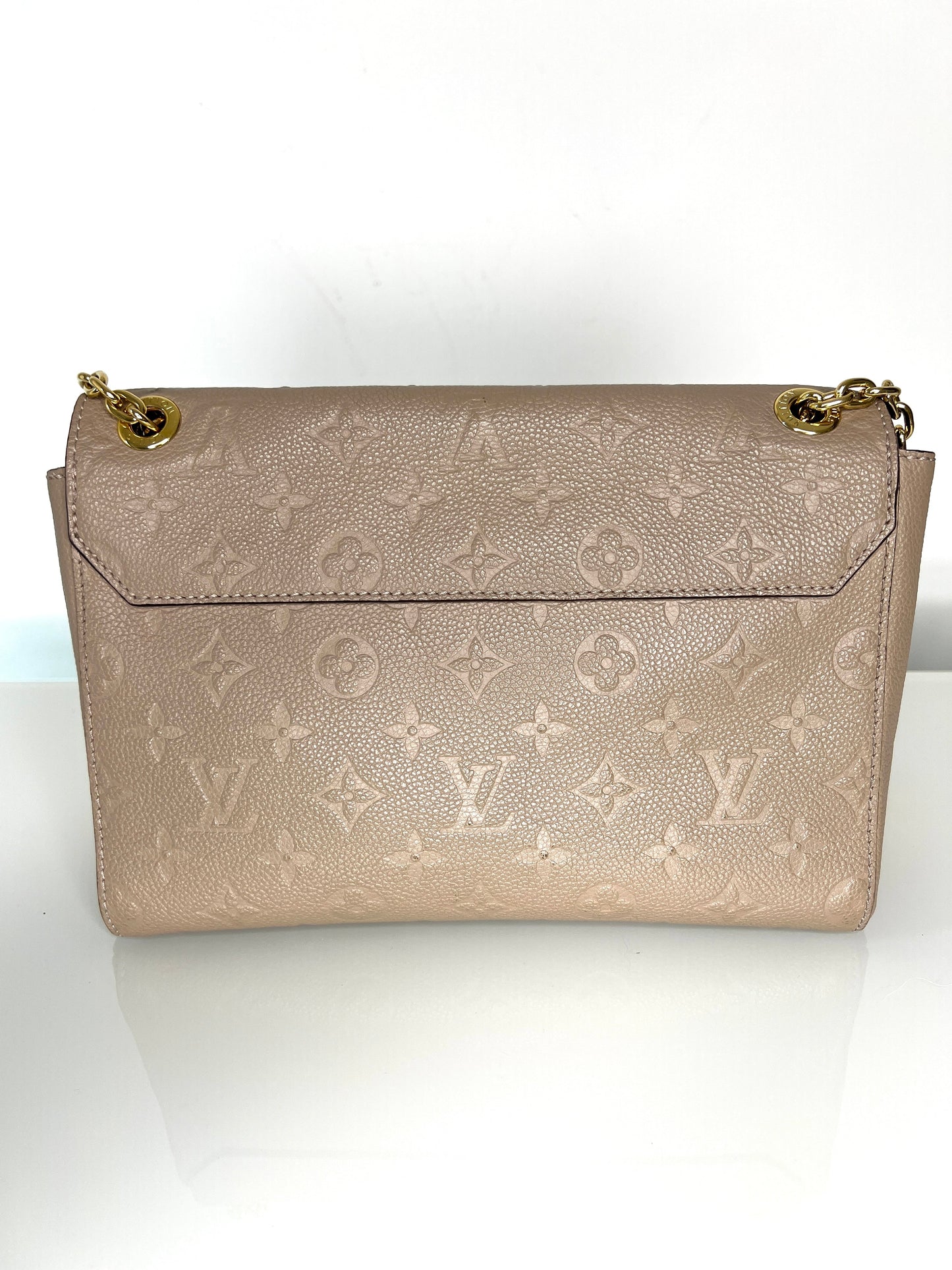 Louis Vuitton Pre-Loved Vavin PM beige Empreinte Leather Shoulder Bag