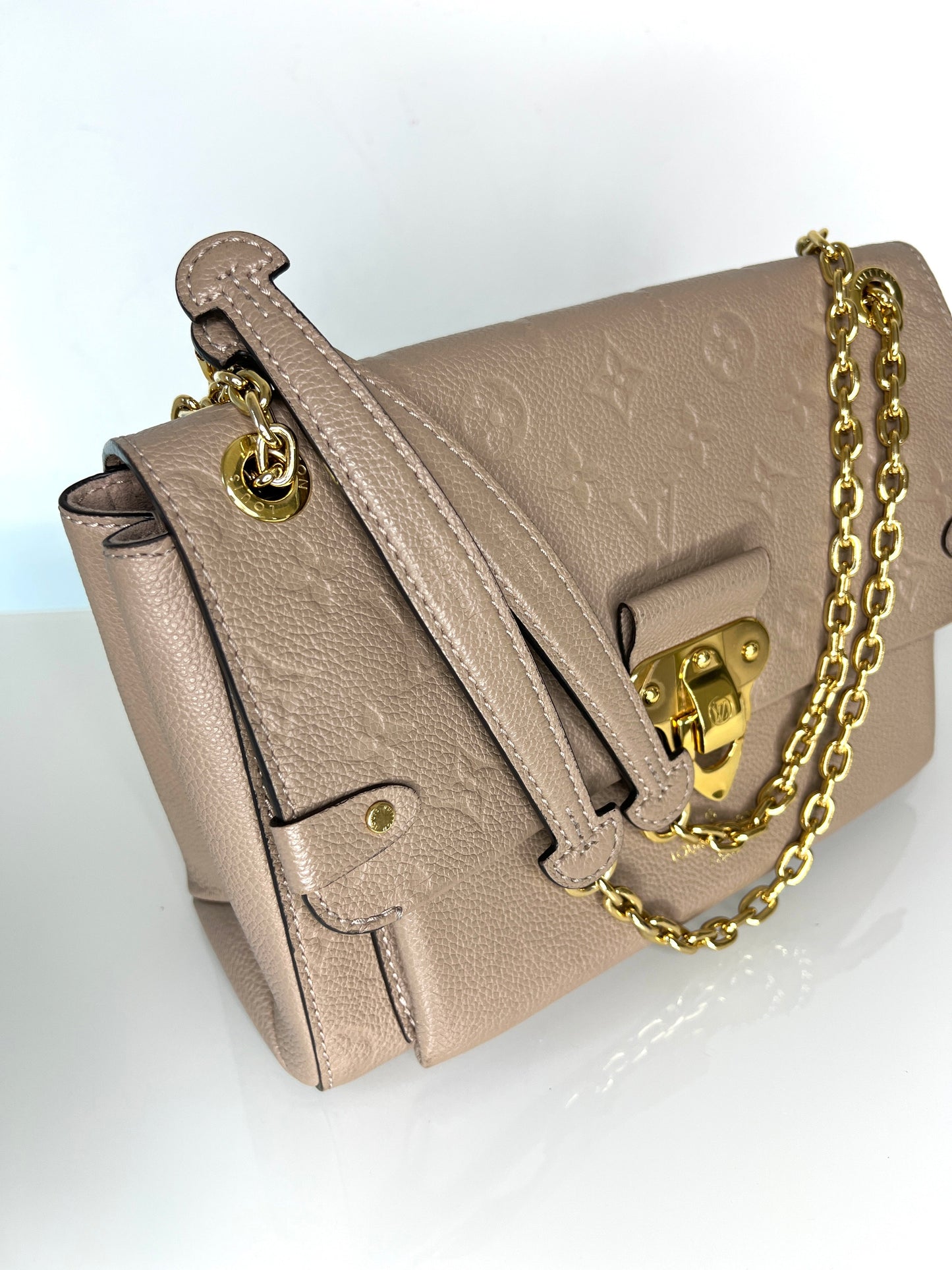 Louis Vuitton Pre-Loved Vavin PM beige Empreinte Leather Shoulder Bag
