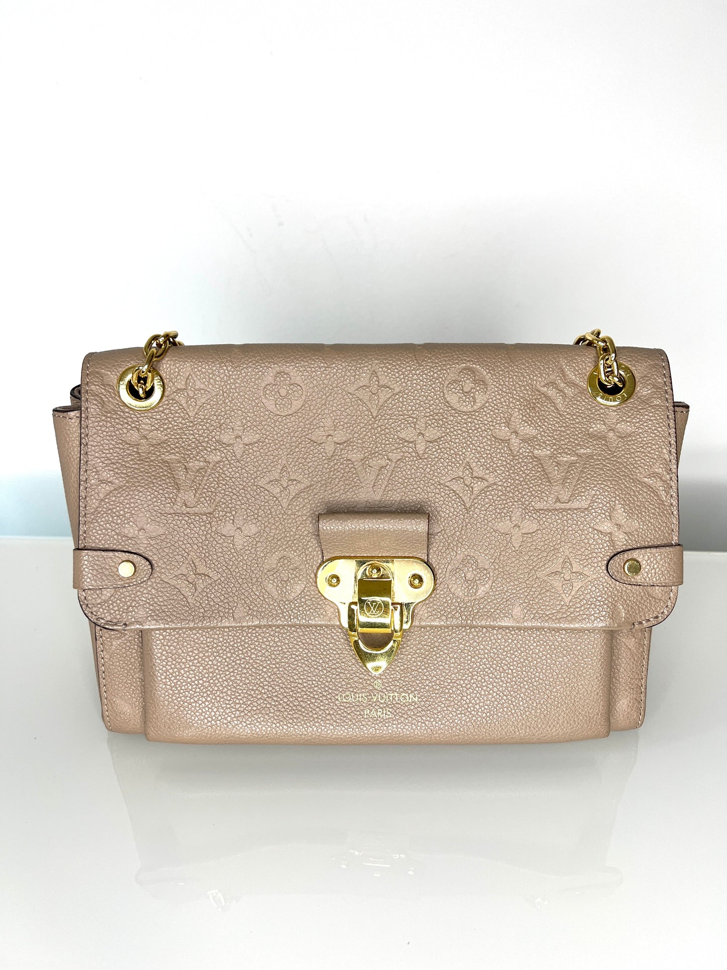 Louis Vuitton Pre-Loved Vavin PM beige Empreinte Leather Shoulder Bag
