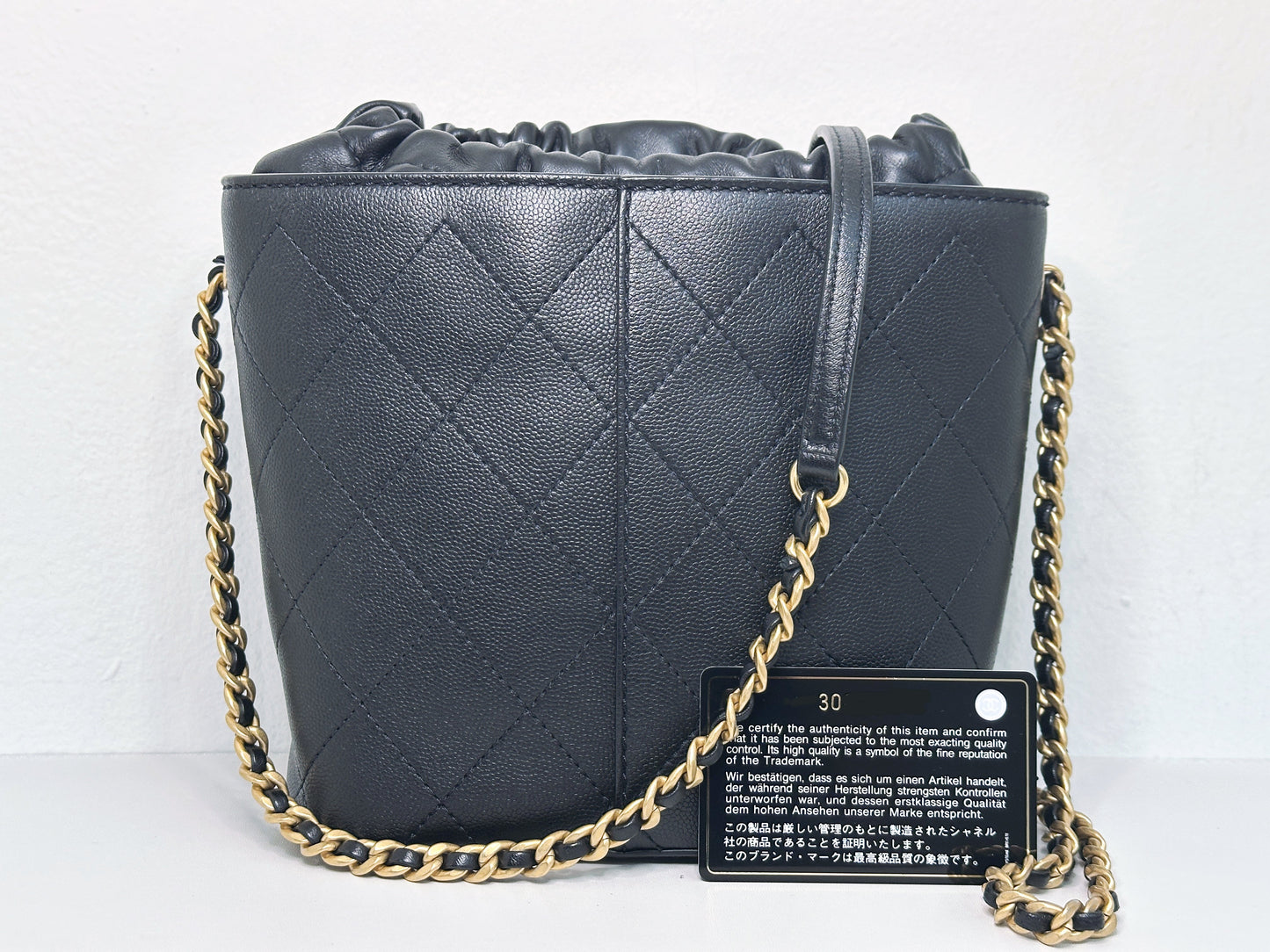 Chanel Drawstring Bucket Bag Quilted Black Caviar Aged Gold Hardware 3088 holo card