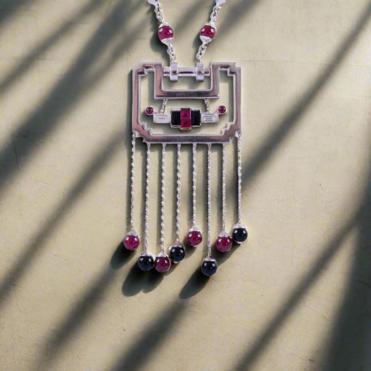 Estate Jewelry Cartier Diamond, Ruby And Onyx 'Le Baiser du Dragon' Necklace