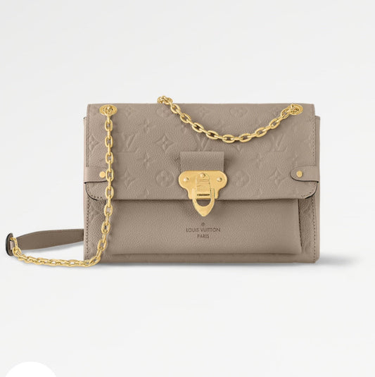 Louis Vuitton Pre-Loved Vavin PM beige Empreinte Leather Shoulder Bag