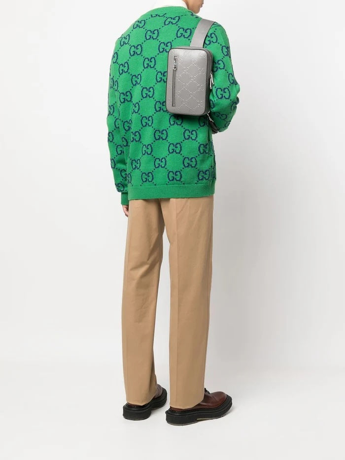 GUCCI GG EMBOSSED LEATHER SLINGBAG