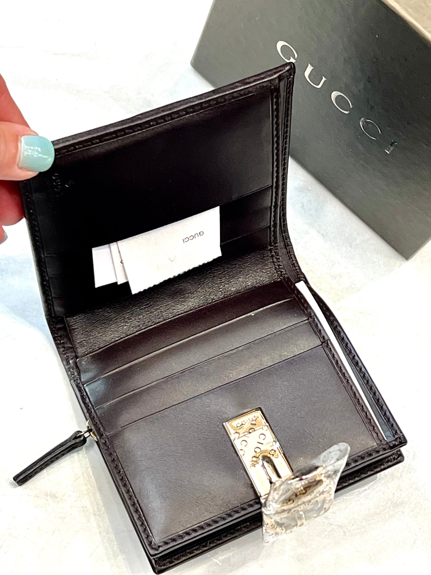 GUCCI GG LEATHER COMPACT WALLET