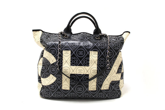 CHANEL Chanel Black and Beige Coated Canvas Camellia Flower Tote Bag | Havik Shop.com - Shop Now at Havik Shop.com