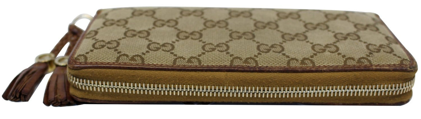 GUCCI GG Canvas Zip Around with Tassels Wallet 261393
