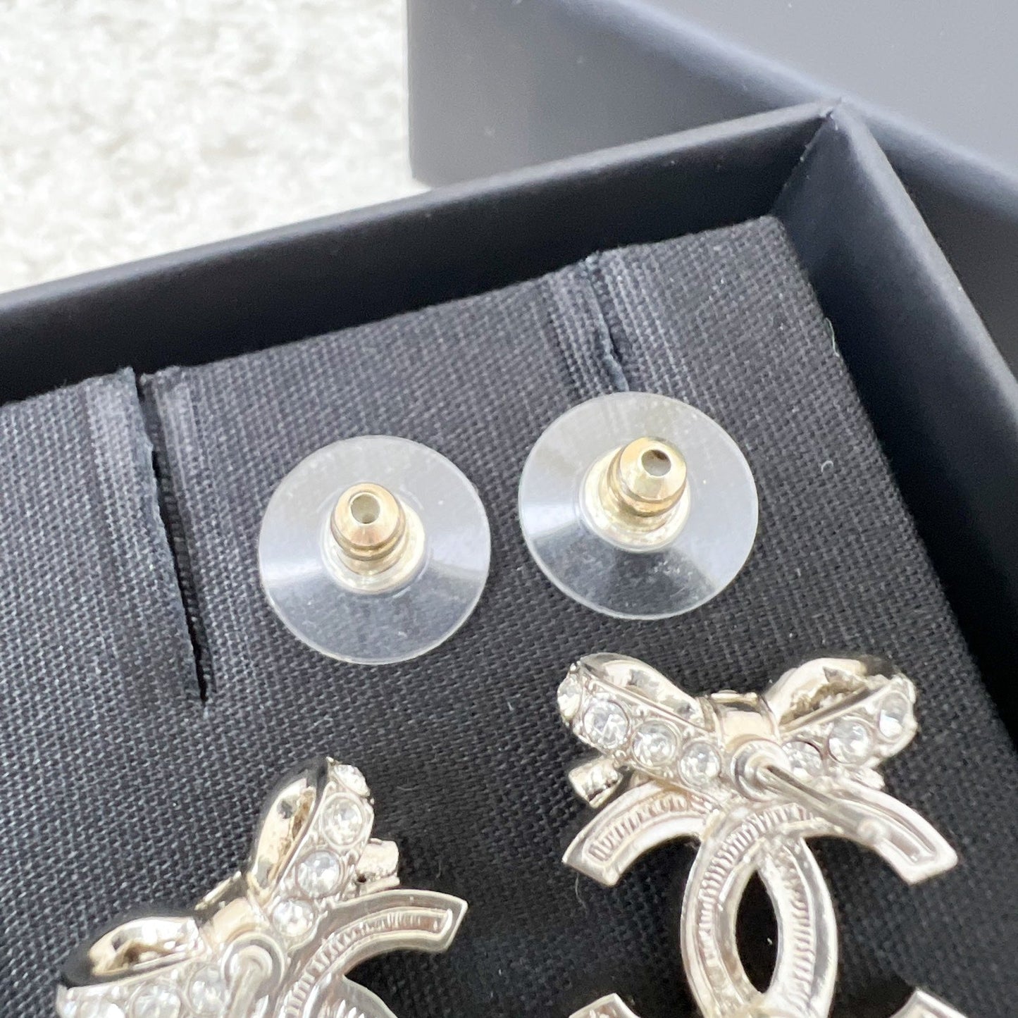 Chanel 23S Ribbon Earrings with Crystals in SHW