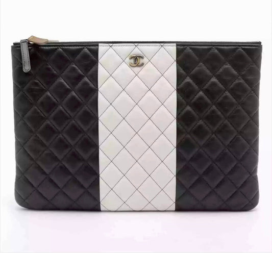 CHANEL Quilted Lambskin Large O-Case Pouch