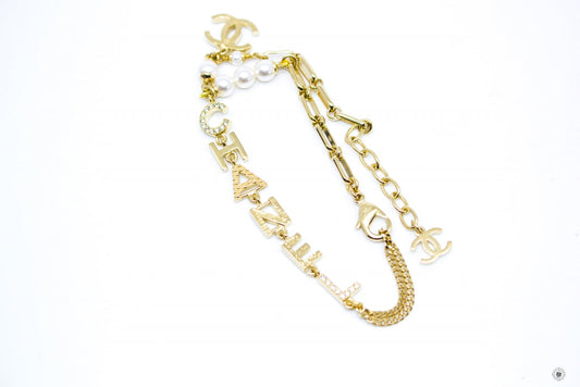 Chanel AB7943B07831 With CC Logo And Crystal  Gold / NH336 Metal Bracelet Ghw