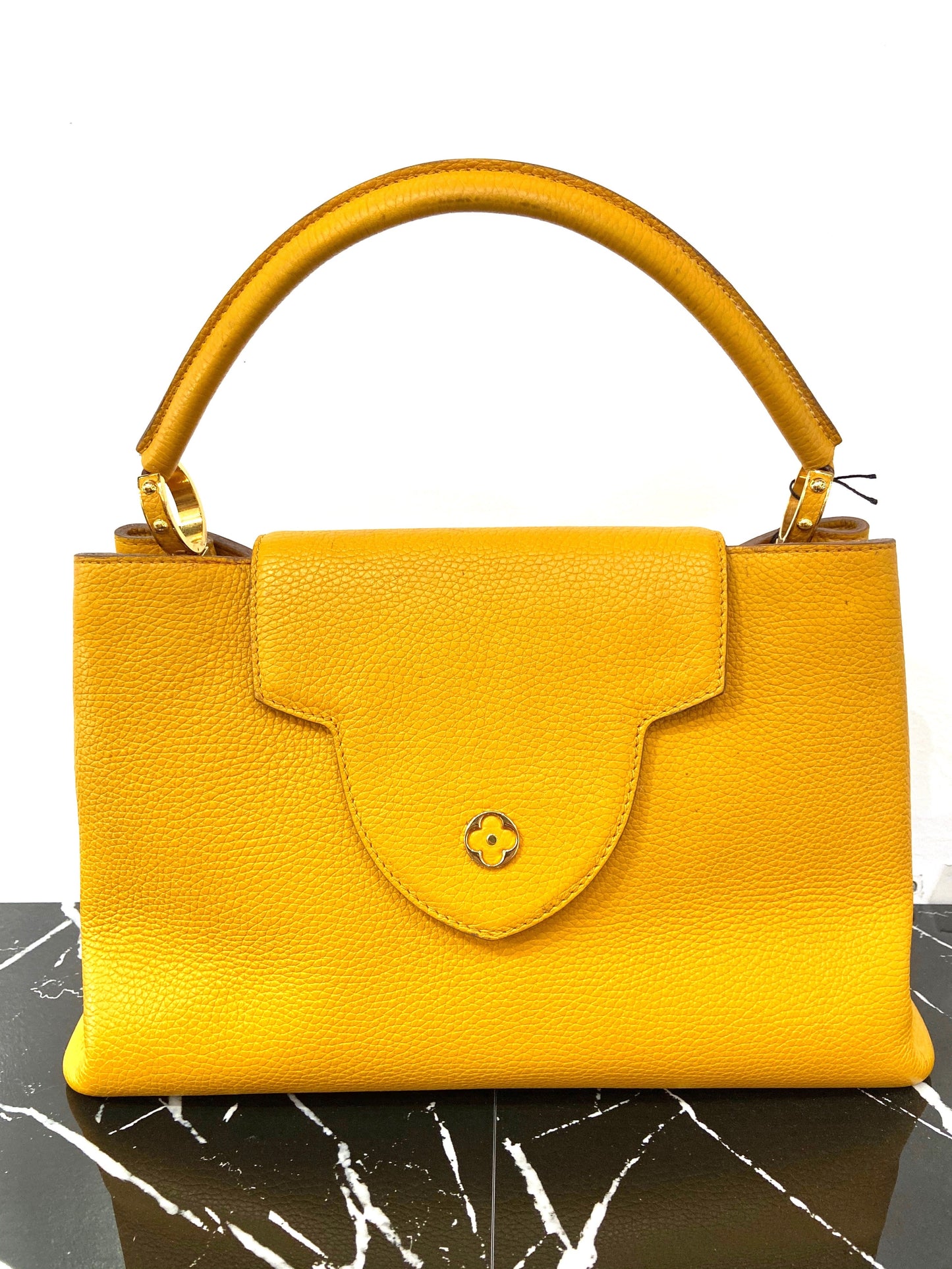 LOUIS VUITTON TAURILLON CAPUCINES MM HANDBAG TOURENESOL