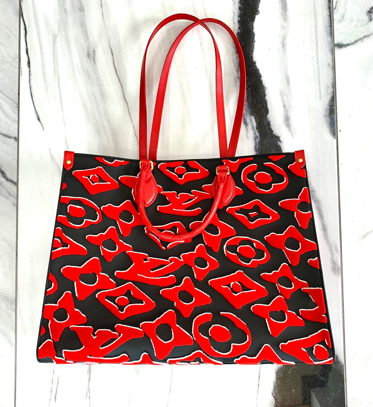 LOUIS VUITTON ON-THE-GO FISCHER MONOGRAM SHOULDER BAG