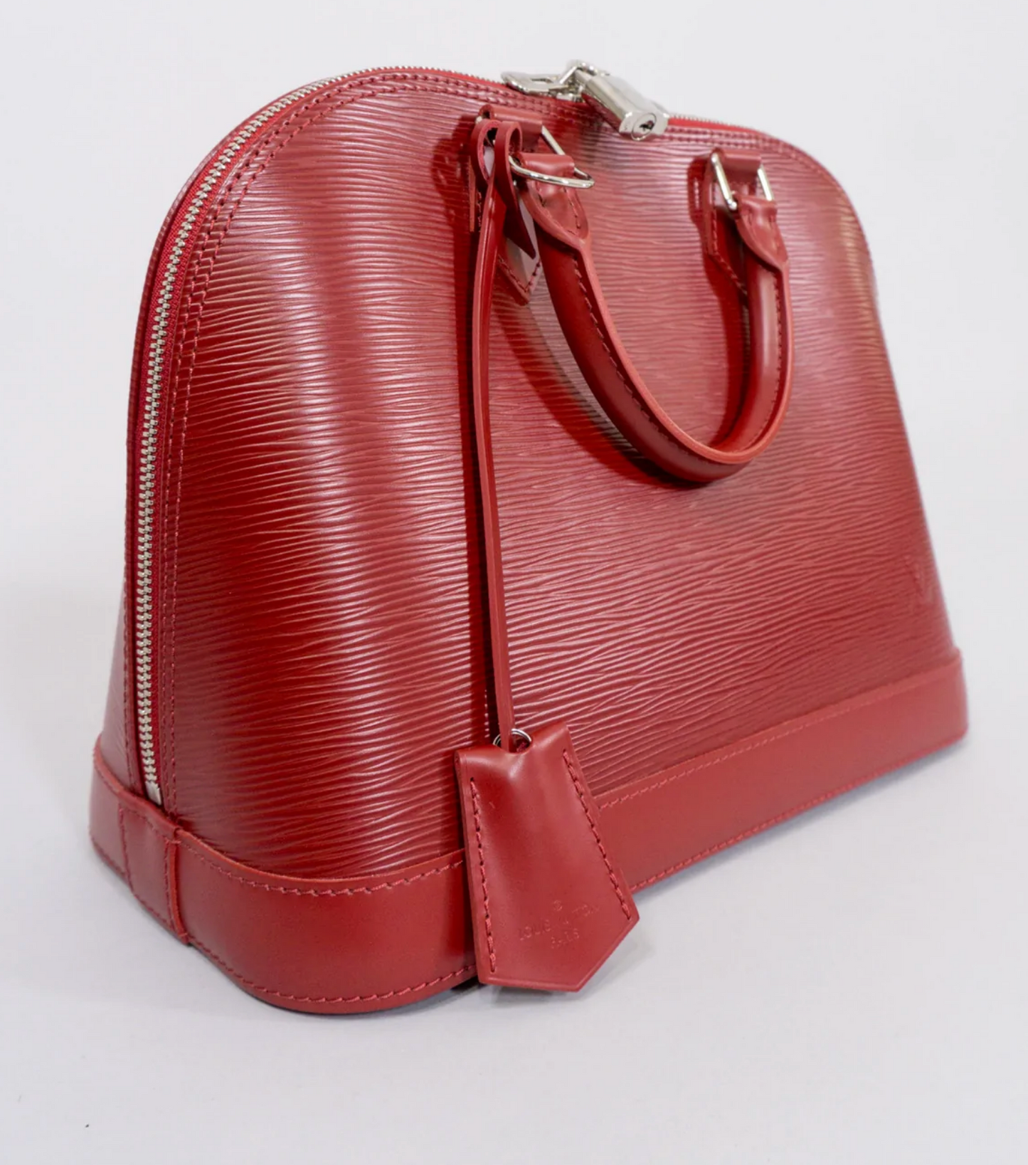 LOUIS VUITTON EPI ALMA NM HANDBAG