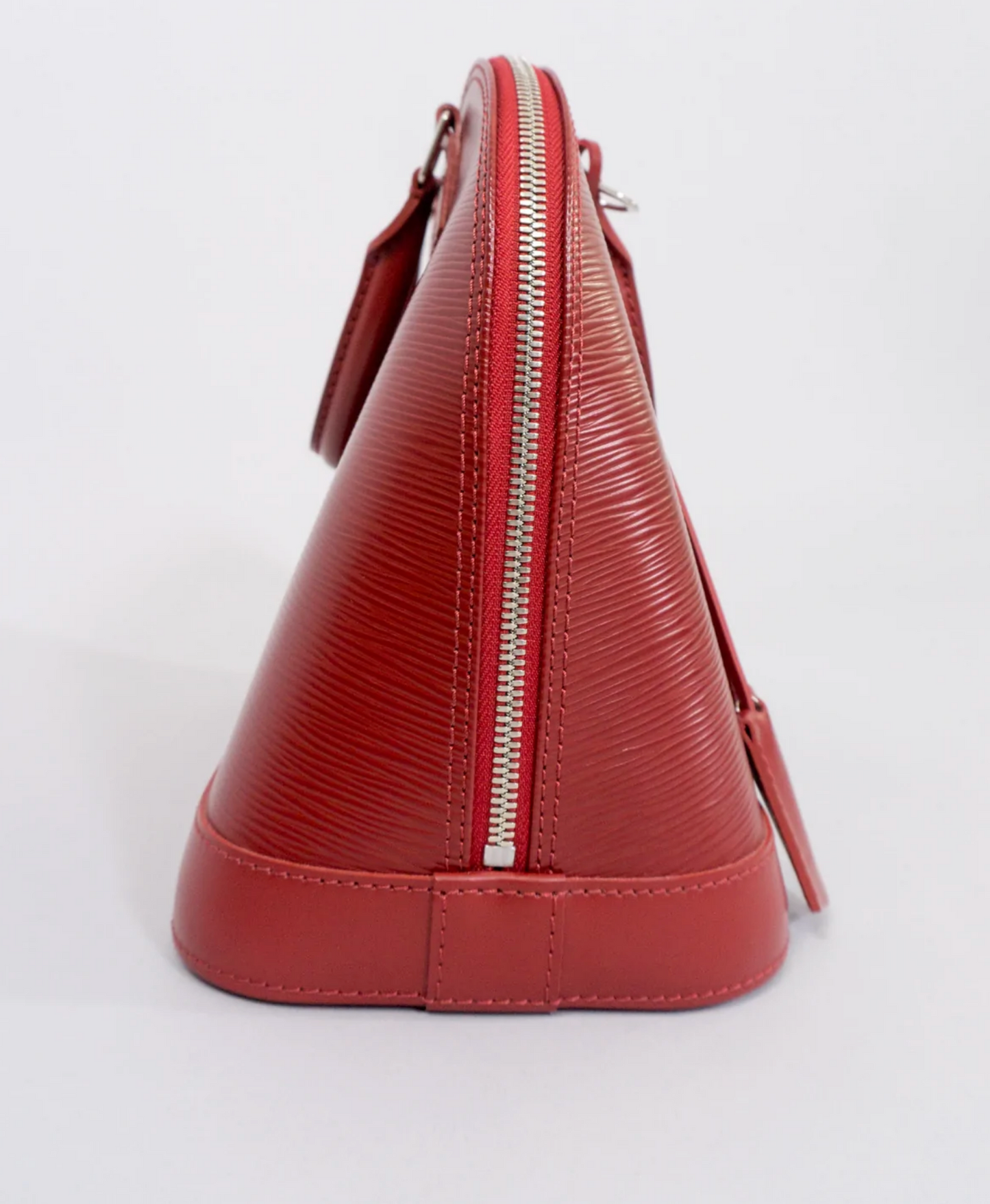 LOUIS VUITTON EPI ALMA NM HANDBAG