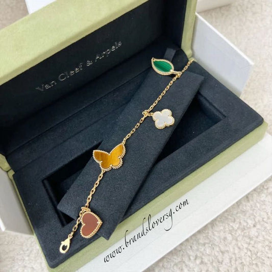 Van Cleef & Arpels VCA 4 Motif Alhambra Lucky Spring Bracelet with Carnelian, MOP, Tiger's eye and Malachite in 18K Gold