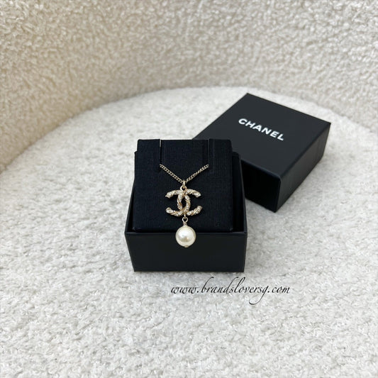 Chanel CC Logo with Dangling Pearl Necklace in Aged Gold HW
