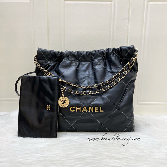 Chanel 22 Medium Hobo Handbag in Black Calfskin with White Stitch Quilting and AGHW (Model: AS3261)